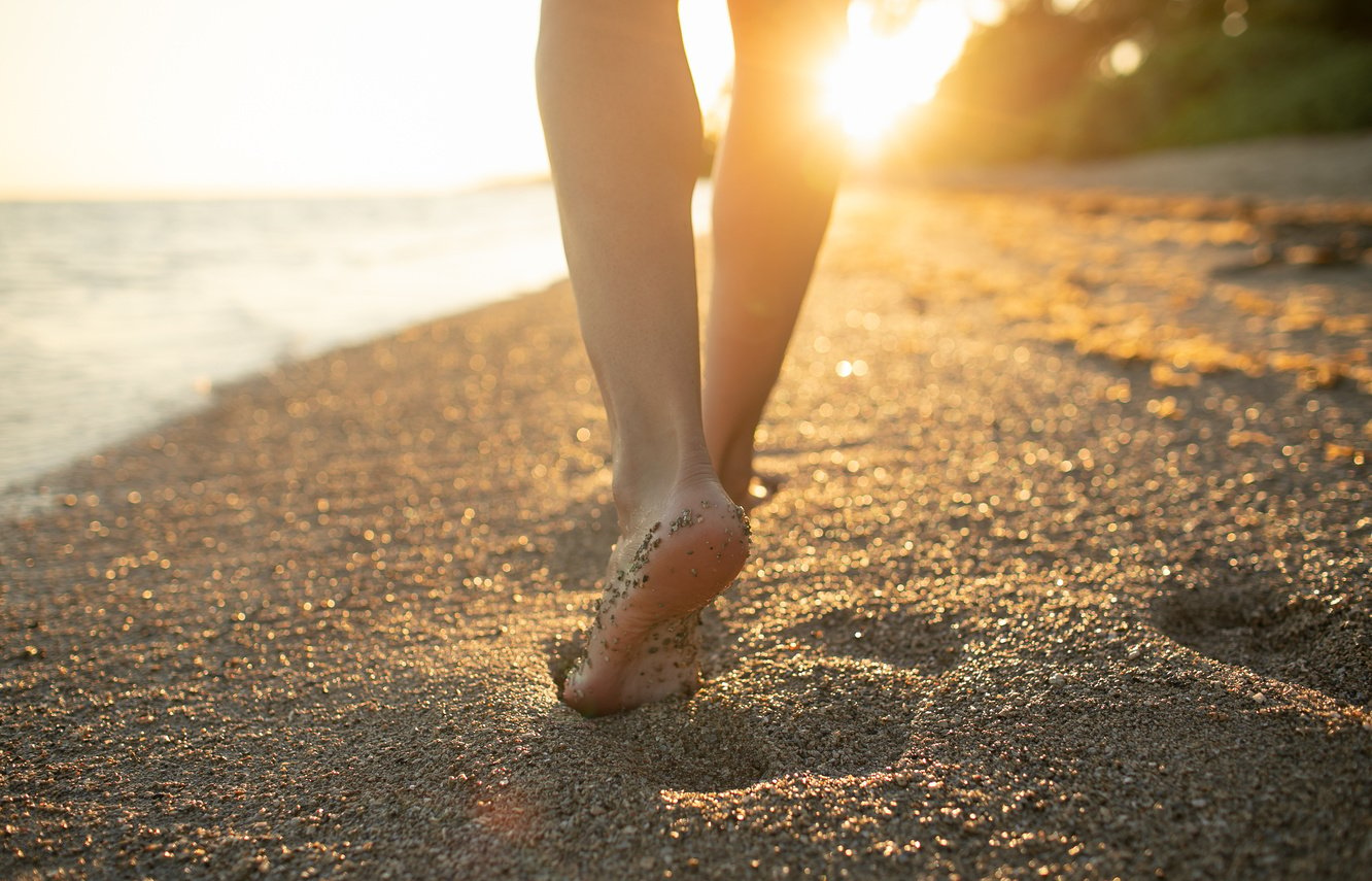 Woman walking on the beach